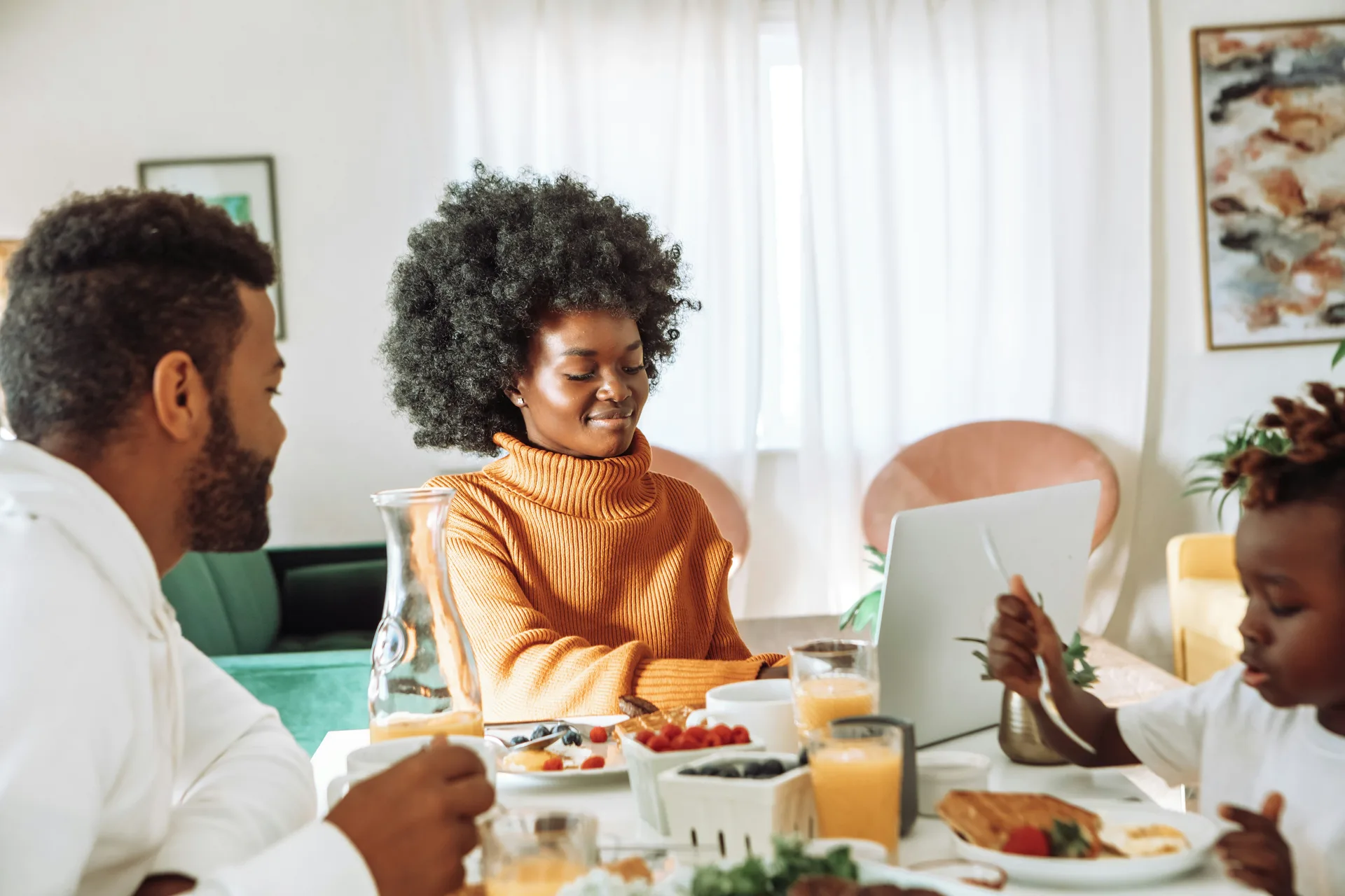 East African family discussing finances